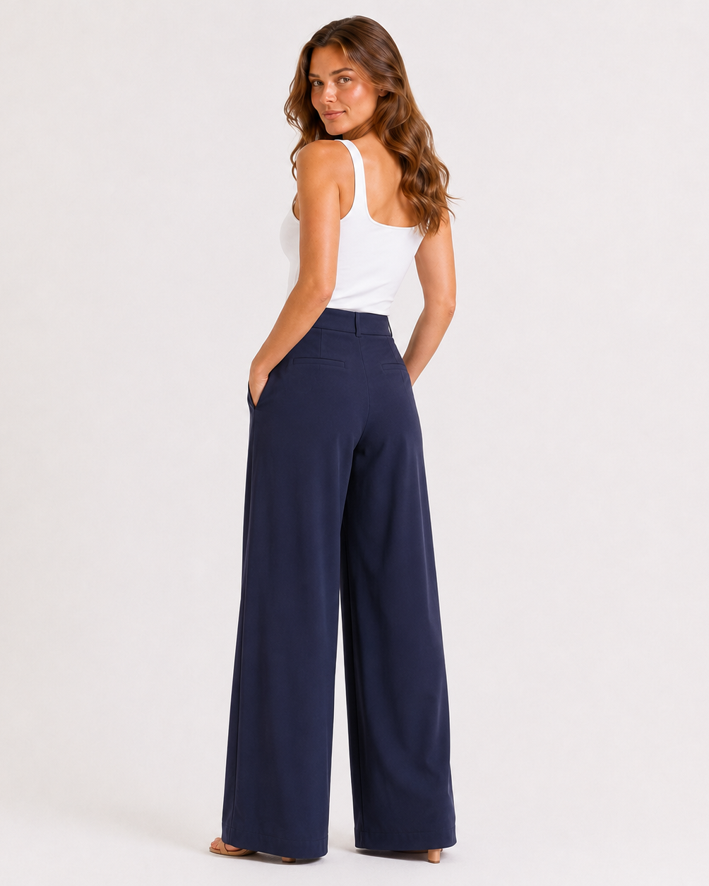 CELESTE PLEATED WIDE-LEG TROUSERS