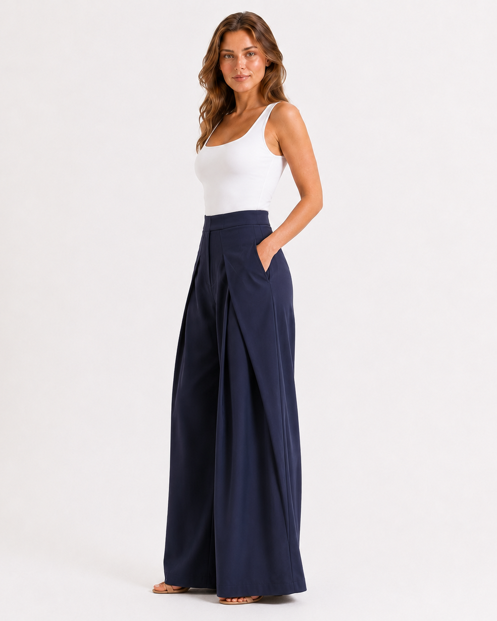 CELESTE PLEATED WIDE-LEG TROUSERS