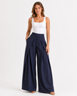 CELESTE PLEATED WIDE-LEG TROUSERS